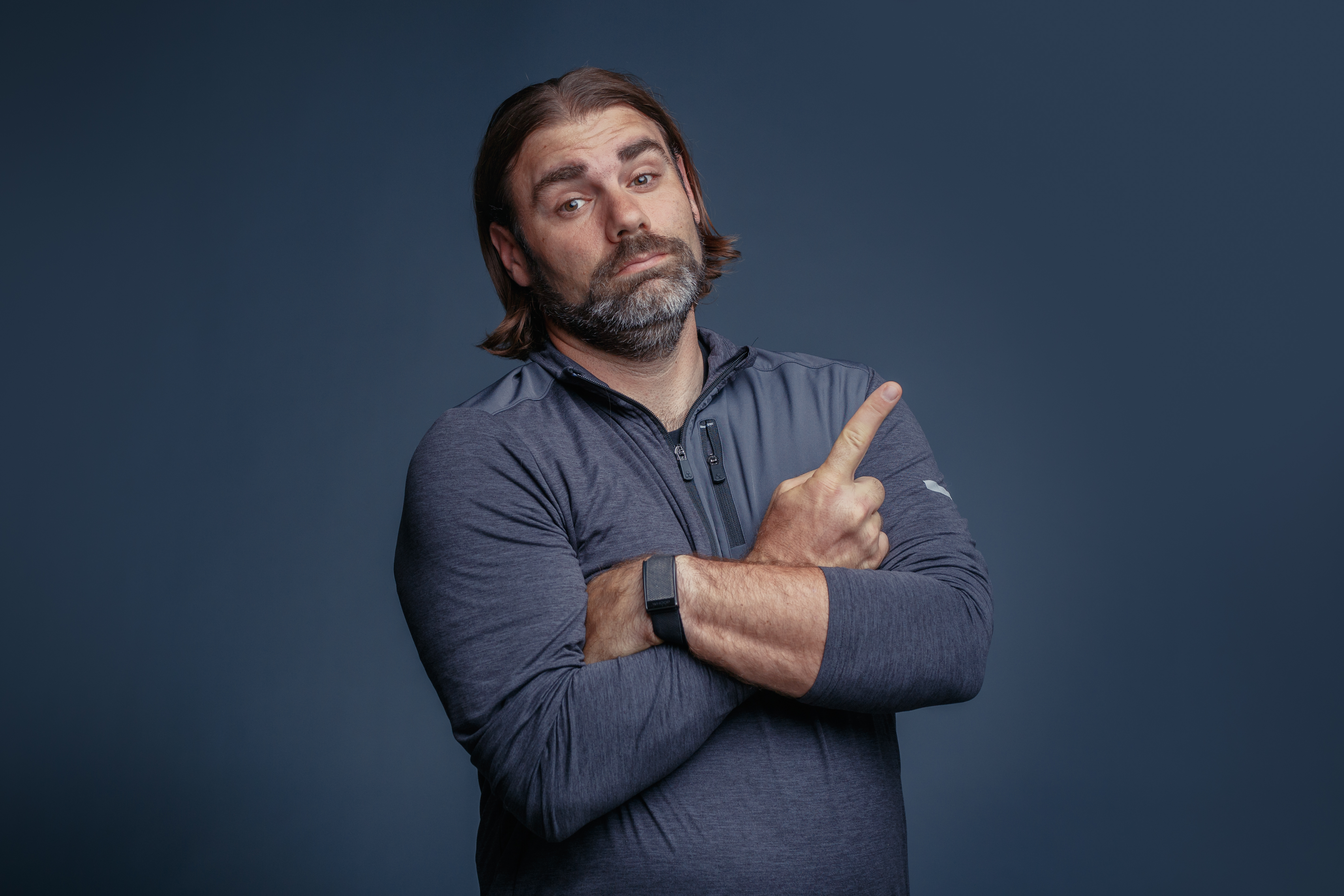 Behind the scenes of Josh Beechraft speaking on The 2mm Shift methodology in front of a studio mic